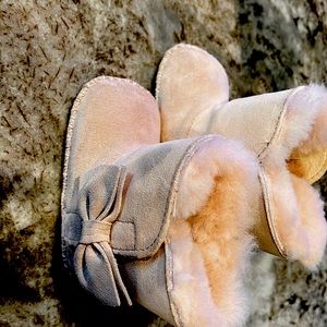 Baby Ugg booties. These are pale pink and like brand new.